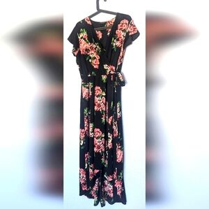 Faux wrap dress. Black floral w/ tie & walkthrough style front w/ flutter sleeve